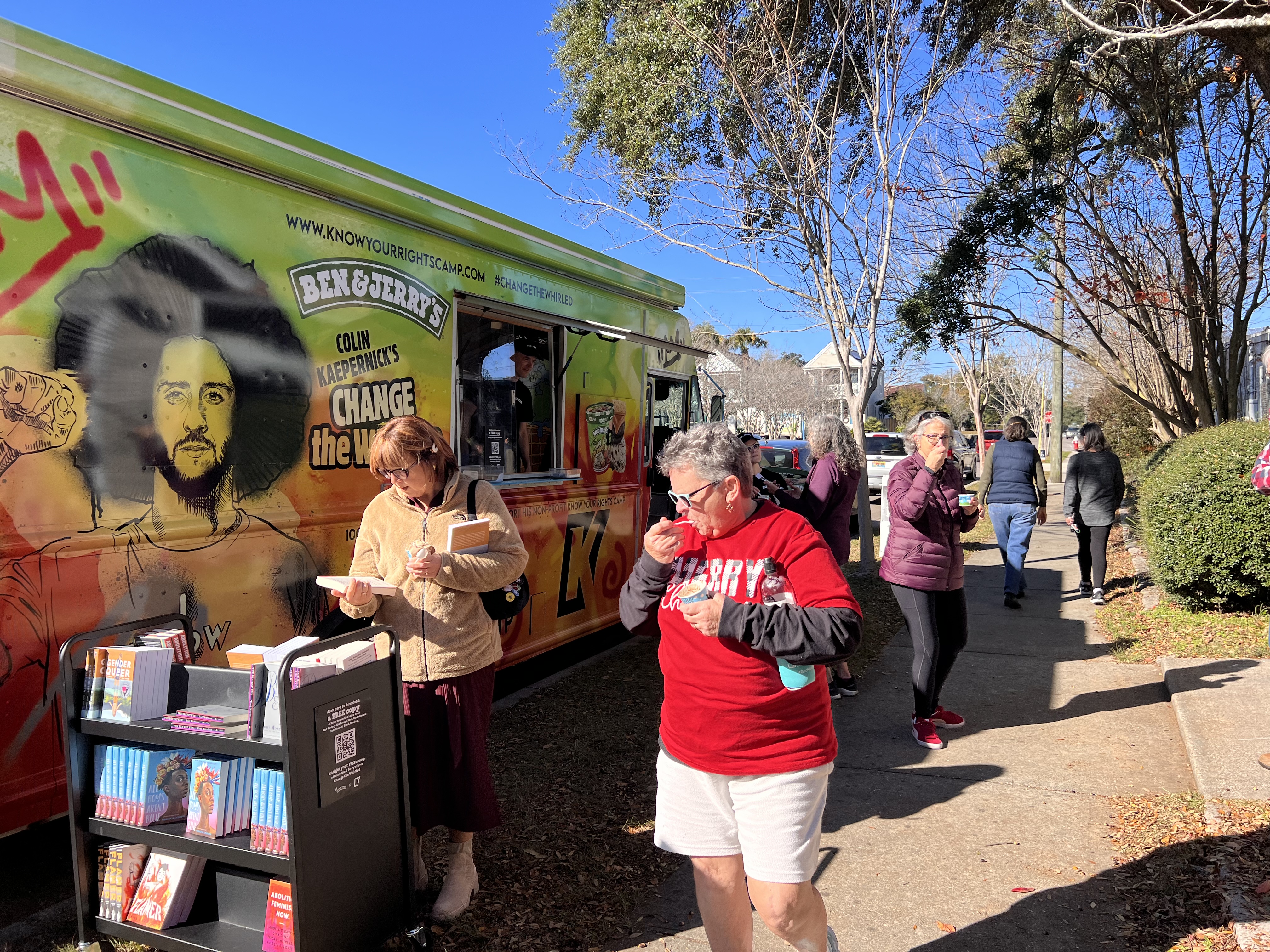 Ben & Jerry's scoop truck with a line of people