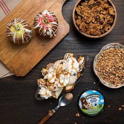 Ben & Jerry's Triple Caramel Chunk ice cream next to a caramel apple split sundae.