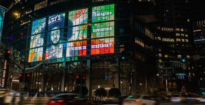 Billboard in Los Angeles that reads: Imagine if we invested in our communities?