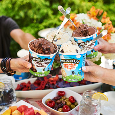 Cheers with pints of Ben & Jerry's Ice Cream
